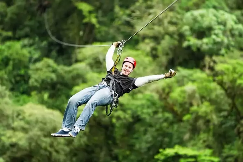 man ziplining in the Smokies